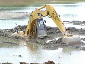 bulldozer-stuck-in-the-mud-300x224.jpg